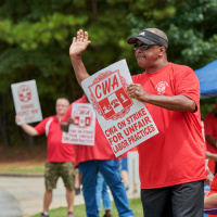 CWA members at a previous demonstartion protesting AT&T.